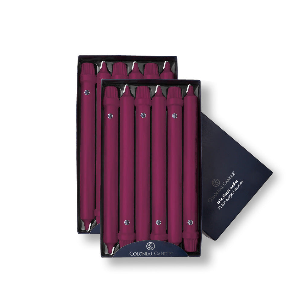 A pack of Colonial Candle® Mulberry Classic Dinner Candles, featuring deep purple-red unscented taper candles in a presentation box with an elegant design, suitable for various occasions.