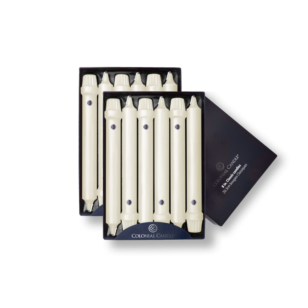A pack of eight-inch ivory taper candles presented in a box, with the Colonial Candle brand visible.